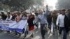 Gono Odhikar Porishod hold a protest calling for free and fair elections, in Dhaka, Bangladesh, Friday, Jan. 5, 2024. 
