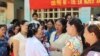 This undated photo provided by the Ramon Magsaysay Award Foundation shows 2024 Ramon Magsaysay Awardee, Nguyen Thi Ngoc Phuong, center, from Vietnam. (Ramon Magsaysay Awards Foundation via AP)