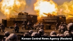 The Korean People's Army conducts an artillery firing drill in North Korea on March 7, 2024, in this photo released on March 8, 2024, by the Korean Central News Agency, according to the KCNA. (KCNA via Reuters)