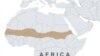 Image released by Oxfam shows a women pointing at the dry land in Oud Guedara. Early indicators point to a likely food crisis in 2012, with people at particularly high risk in Mauritania, Niger, Burkina Faso, Mali and Chad, December 11, 2011.