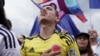 Seguidores del candidato presidencial colombiano de centro-derecha Federico Gutiérrez del equipo de coalición del gobierno para Colombia asisten a su mitin de clausura de la campaña en Medellín, Colombia, el 22 de mayo de 2022. 