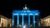 Germany's landmark the Brandenburg Gate is illuminated to mark the 75th anniversary of Victory Day and the end of World War II in Europe, in Berlin, Germany, May 8, 2020. 