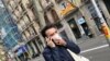 A man wears a protective face mask as he walks along a street, after novel coronavirus has been confirmed in Barcelona, Spain February 25, 2020. 