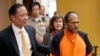 FILE - Juan Francisco Lopez-Sanchez (R), charged with the murder of 32-year-old Kathryn Steinle, is seen being escorted into a courtroom at the Hall of Justice in San Francisco, July 7, 2015.