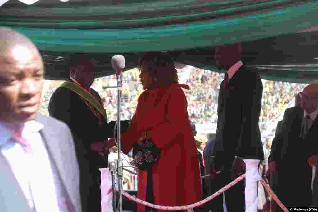 Bona, daughter of former Zimbabwe leader Robert Mugabe congratulating his father successor Emmerson Mnangagwa, Aug. 26, 2018, in Harare after being sworn to head the country’s second republic. 