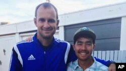 FILE -- American adventurer John Allen Chau, right, stands for a photograph in October with Founder of Ubuntu Football Academy Casey Prince, 39, in Cape Town, South Africa, days before he left for in a remote Indian island of North Sentinel Island, where he was killed last week.
