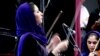The consequences of Afghanistan's increasingly deadly war are weighing the heaviest on the nation's civilians. But violence and social pressures have not deterred members of the country's nascent orchestra of mostly young girls from using music to "heal wounds" and promote women's rights in the strictly conservative Muslim society. 
