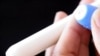 A drop of microbicide gel is photographed as it is squeezed from an applicator at the Baragwanath Hospital in Soweto, South Africa. The hospital took part in a large microbicide study called CAPRISA 004.