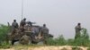 FILE - Afghan soldiers fire a machine gun during a gun battle with Taliban forces in Afghanistan's northern Baghlan province, April 15, 2010. On Tuesday, the Taliban captured the province's Tala Wa Barfak district as part of its latest "spring offensive."