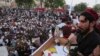 FILE - In this April 22, 2018, file photo, Manzoor Pashteen, a leader of Pashtun Tahafuz (Protection) Movement or (PTM) addresses his supporters during a rally in Lahore, Pakistan.