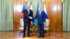 İlham Əliyev və Vladimir Putin.