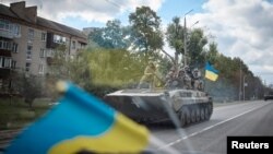 Українські Збройні Сили після звільнення від російської окупації міста Куп'янськ, Харківщина, 19 вересня 2022. Ukrainian Presidential Press Service/REUTERS