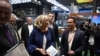 President of the far-right National Rally party and French MP Marine Le Pen (C) and French far-right 'RN' runner candidate for the upcoming European election Jordan Bardella (C-R) visit the annual energy transition fair "BePOSITIVE" exhibit, Feb. 14, 2019, Chassieu, France.