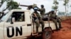 FILE - U.N. peacekeepers patrol outside Bria, Central African Republic, May 26, 2017. 