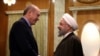 FILE - Turkey's President Recep Tayyip Erdogan, left, and Iran's President Hassan Rouhani greet each other before a meeting with Russia's President Vladimir Putin, in Sochi, Russia, Nov. 22. 2017.