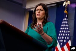 FILE - White House press secretary Sarah Sanders speaks during the press briefing at the White House, May 7, 2018. Sanders said the White House has compete confidence in Gina Haspel, President Donald Trump's nominee to head the Central Intelligence Agency.
