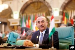 Turkey's Foreign Minister Mevlut Cavusoglu attends Islamic Summit of the Organization of Islamic Cooperation in Mecca, Saudi Arabia, June 1, 2019.