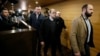 Cardinal Philippe Barbarin, Archbishop of Lyon, walks inside the courthouse during a break in his trial, charged with failing to act on historical allegations of sexual abuse of boy scouts by a priest in his diocese, Lyon, France, Jan. 7, 2019.