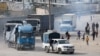 Trucks carrying aid arrive, amid the ongoing conflict between Israel and the Palestinian Islamist group Hamas, in Rafah in the southern Gaza Strip Jan. 17, 2024. 