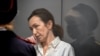 (FILES) Alsu Kurmasheva, a US-Russian journalist for Radio Free Europe/Radio Liberty (RFE/RL) who was arrested last year for failing to register as a "foreign agent", attends a hearing on the extention of her pre-trial detention, at the Sovetski court in 