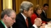 U.S. Secretary of State John Kerry, second from left, meets with leaders of the Syrian Opposition Coalition at the Hotel Excelsior in Rome, February 28, 2013.
