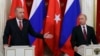 Russian President Vladimir Putin and his Turkish counterpart Recep Tayyip Erdogan attend a news conference after their meeting at the Kremlin in Moscow, Russia, Jan. 23, 2019.