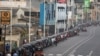 FILE - Three-wheelers queue to buy petrol due to fuel shortage, amid the country's economic crisis, in Colombo, Sri Lanka, July 5 2022.