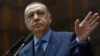 Turkey's President Recep Tayyip Erdogan addresses his supporters at the parliament in Ankara, Turkey, Nov. 28. 2017.