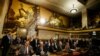 FILE - Members of the opposition Syrian Negotiations Commission attend the first meeting of the new Syrian Constitutional Committee at the United Nations in Geneva, Oct. 30, 2019. 
