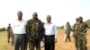 A picture released by Thabo Mbeki's spokesman shows former President of Burundi Pierre Buyoya and AU mediator for the Sudan crisis Thabo Mbeki with Sudan People's Liberation Army (SPLA) commander, Abdel Aziz al-Hilu (C), at his military headquarters in S