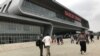 FILE - Passengers arrive to purchase tickets for the Standard Gauge Railway (SGR) line constructed by the China Road and Bridge Corporation (CRBC) and financed by Chinese government at the Nairobi Terminus in Nairobi, Kenya, July 28, 2017. 
