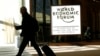 An attendee leaves the Congress Hall during the World Economic Forum (WEF) annual meeting in Davos, Switzerland, Jan. 20, 2017.