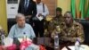 United Nations Secretary-General Antonio Guterres (L) sits next to Malian Army General Didier Dacko, Force Commander of the G5 Sahel, an institutional framework for coordination of regional cooperation in development policies and security matters in West Africa, in Sevare on May 30, 2018, during Guterres' two-day visit to Mali. 