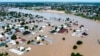 Homes and other buildings are partially submerged following a dam collapse, in Maiduguri, Nigeria, Sept 10, 2024.