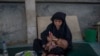 A Rohingya Muslim woman, who crossed over from Myanmar into Bangladesh, feeds her daughter inside the centre of Action contre La Faim (ACF) for malnutrition children near Kutupalong, Bangladesh, Sunday, Oct. 22, 2017.