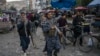 Taliban fighters patrol a market in Kabul's Old City, Afghanistan, Sept. 14, 2021.