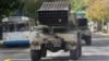 Arhiva - Proruski pobunjenici voze mobilne višecevne lansere raketa tipa Grad, ulicama grada Donjecka, Ukrajina, 11. septembra 2014. 