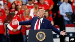 President Donald Trump addresses a campaign rally in Minneapolis, Oct. 10, 2019.