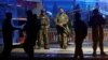 Afghan security forces arrive at the site of a suicide bomb attack in Kabul, Afghanistan, Nov. 20, 2018. 