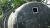 MIC storage tank 610 which overflowed, causing fatal gas leak
