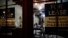 "For lease" signs are seen on an empty retail space s the COVID-19 outbreak continues in the Historic Third Ward neighborhood of Milwaukee, Wisconsin, Oct. 31, 2020.