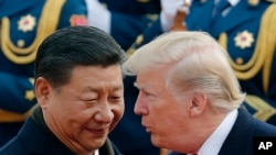 Archivo - Encuentro de los presidentes de Estados Unidos y China, en noviembre de 2017. Eso podría repetirse en Osaka, Japón.