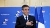 Francois Fillon puts his hand on his heart after delivering a speech following the conservative presidential primary, in Paris, France, Nov. 27, 2016. An ex-prime minister, Fillon roundly defeated Alain Juppe, another former head of government.