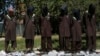 File - Insurgents suspected of being from the Haqqani network are presented to the media at the National Directorate of Security (NDS) headquarters in Kabul, May 2013.