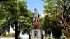 A vandalized statue of Christopher Columbus towers over Columbus Square in Port of Spain, Trinidad and Tobago, Aug. 28, 2024. 