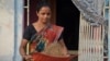 A woman winnows high-iron Dhanshakti pearl millet in Andhra Pradesh, India. Photo: Alina Paul-Bossuet (ICRISAT)