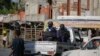 Police patrol the streets of downtown Port-au-Prince, Haiti, on Jan. 22, 2024. Six Roman Catholic nuns who were kidnapped about a week ago were released on Jan. 24.