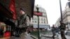 FILE - French soldiers patrol in the street near a department store in Paris as part of the highest level of "Vigipirate" security plan in Paris, January 10, 2015.