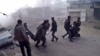 This frame grab from video released by the Syrian Civil Defense White Helmets, which has been authenticated based on its contents and other AP reporting, shows members of the Syrian Civil Defense group and civilians carrying victims after airstrikes hit in Ghouta, a suburb of Damascus, Syria, Thursday, March. 1, 2018. 