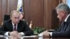 Russian President Vladimir Putin meets with Defense Minister Sergei Shoigu and Foreign Minister Sergei Lavrov at the Kremlin in Moscow, Feb. 2, 2019. 
